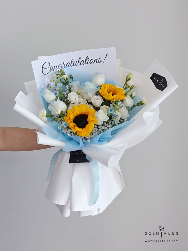 Wisdom In Bloom Fresh Flower Bouquet fresh flower bouquet with sunflower, blue rose, white eustoma, white spray carnation and blue oxypetalum