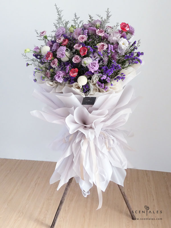 Fresh flower stand Purple eustoma (or rose), purple carnation, white carnation, white ping pong, plenty of purple statice and caspia