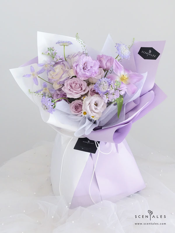 Letters To Myself Flower Bouquet Lilac tulip, lilac curly eustoma, gradient purple rose, lilac rose, lilac matthiola, purple scabiosa, blue trachymene, light purple clematis, white spray carnation, chamomile, light pink pompom and a bit of thlaspi