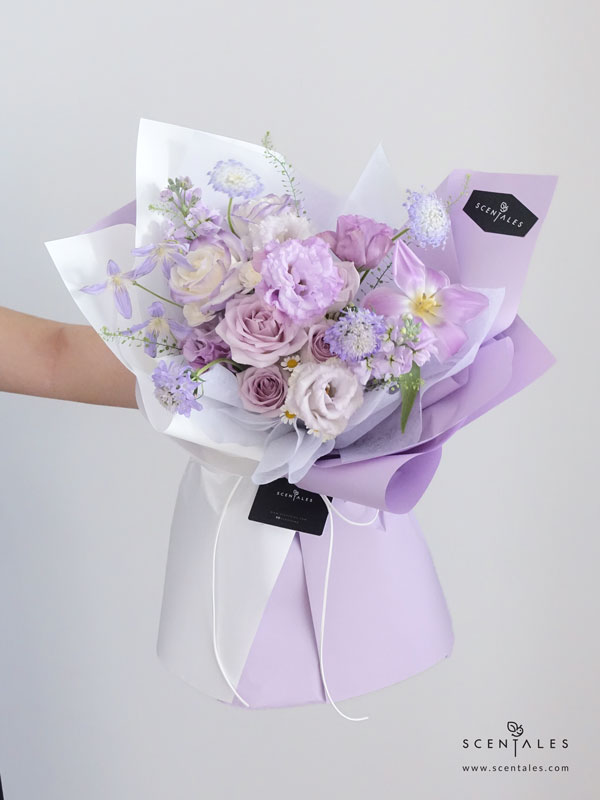 Letters To Myself Flower Bouquet Lilac tulip, lilac curly eustoma, gradient purple rose, lilac rose, lilac matthiola, purple scabiosa, blue trachymene, light purple clematis, white spray carnation, chamomile, light pink pompom and a bit of thlaspi