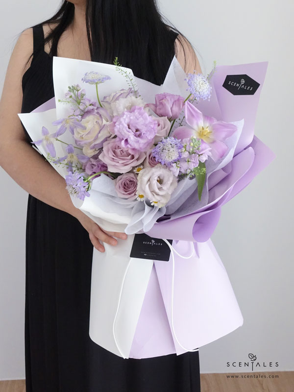Letters To Myself Flower Bouquet Lilac tulip, lilac curly eustoma, gradient purple rose, lilac rose, lilac matthiola, purple scabiosa, blue trachymene, light purple clematis, white spray carnation, chamomile, light pink pompom and a bit of thlaspi