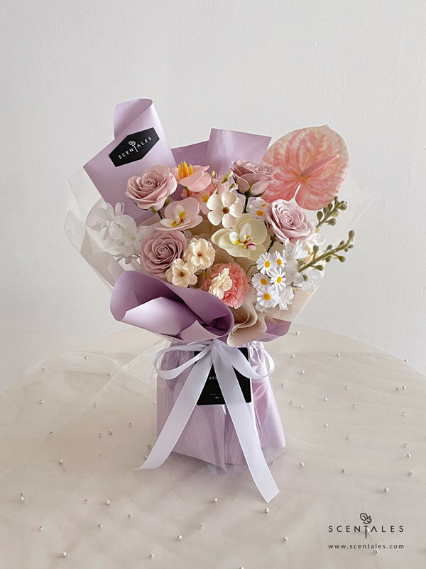 Hadley Soap Flower Bouquet Soap flower bouquet with soap rosy latte rose, soap pink carnation, soap pink bloom tulip, soap pink phalaenopsis, soap cream phalaenopsis, soap small daisy, soap pink begonia, soap cream sakura, soap white hydrangea, artificial matthiola, artificial pink anthurium and dried violet flower