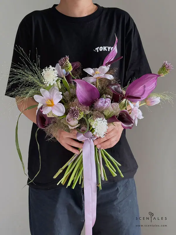 Jensine Bridal Bouquet Fresh Bridal Bouquet with violet dyed tulip, dark purple calla lily, purple anthurium, dancing allium, lilac rose, white rose, panicum, nudsedge and trachymene