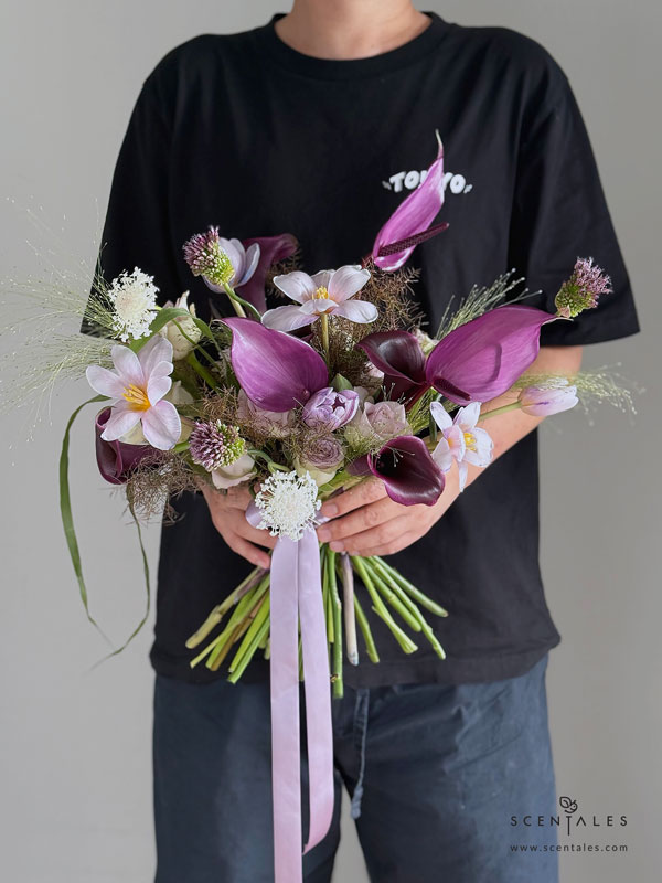 Jensine Bridal Bouquet Fresh Bridal Bouquet with violet dyed tulip, dark purple calla lily, purple anthurium, dancing allium, lilac rose, white rose, panicum, nudsedge and trachymene
